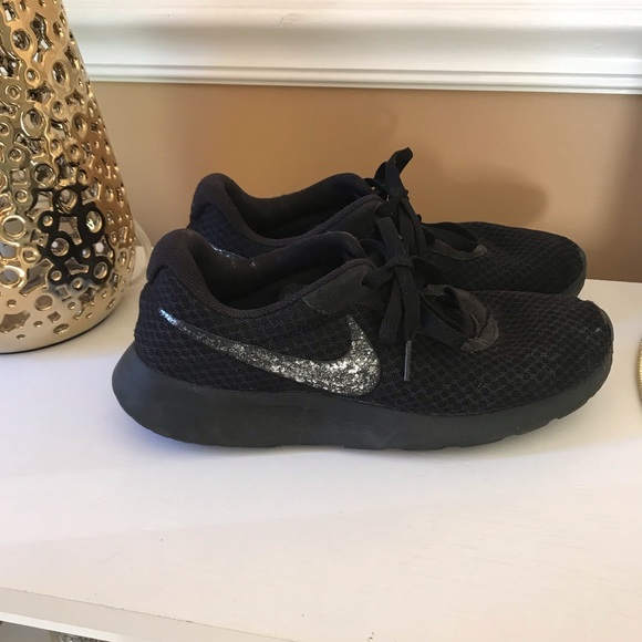 black nike with silver swoosh